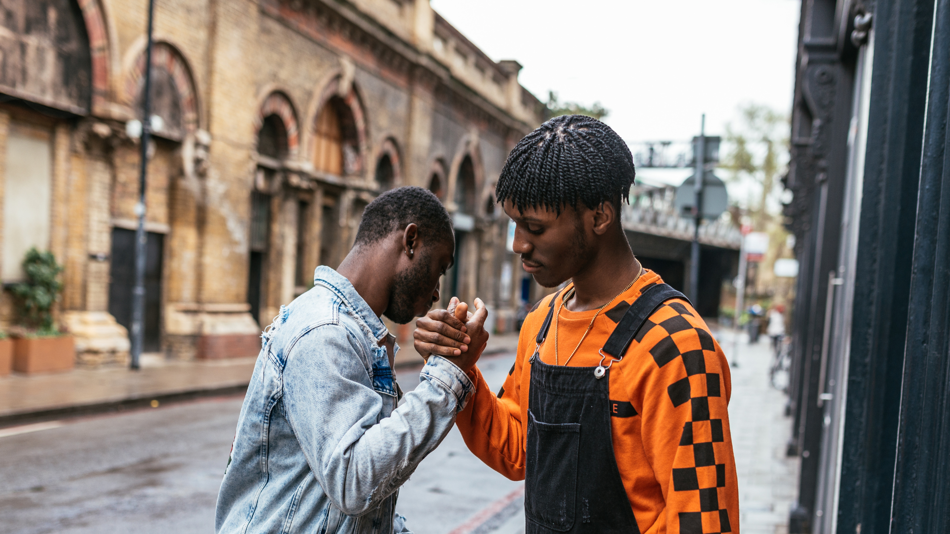Bruhs & Breakthroughs — two men connecting in an urban setting